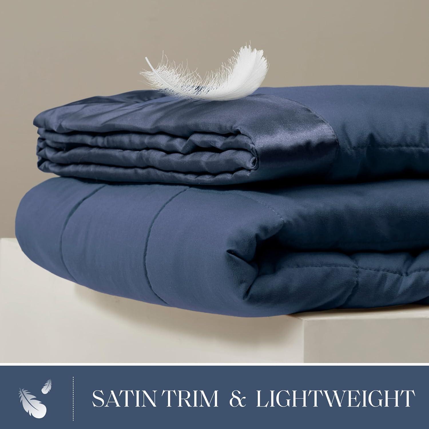 imageMadison Park Twin Blanket Quilted Microfiber Satin Binding 3M Scotchgard Moisture Wicking Treatment Soft and Lightweight Summer Blanket for Couch Windom Twin OrangeSatin Trim Navy