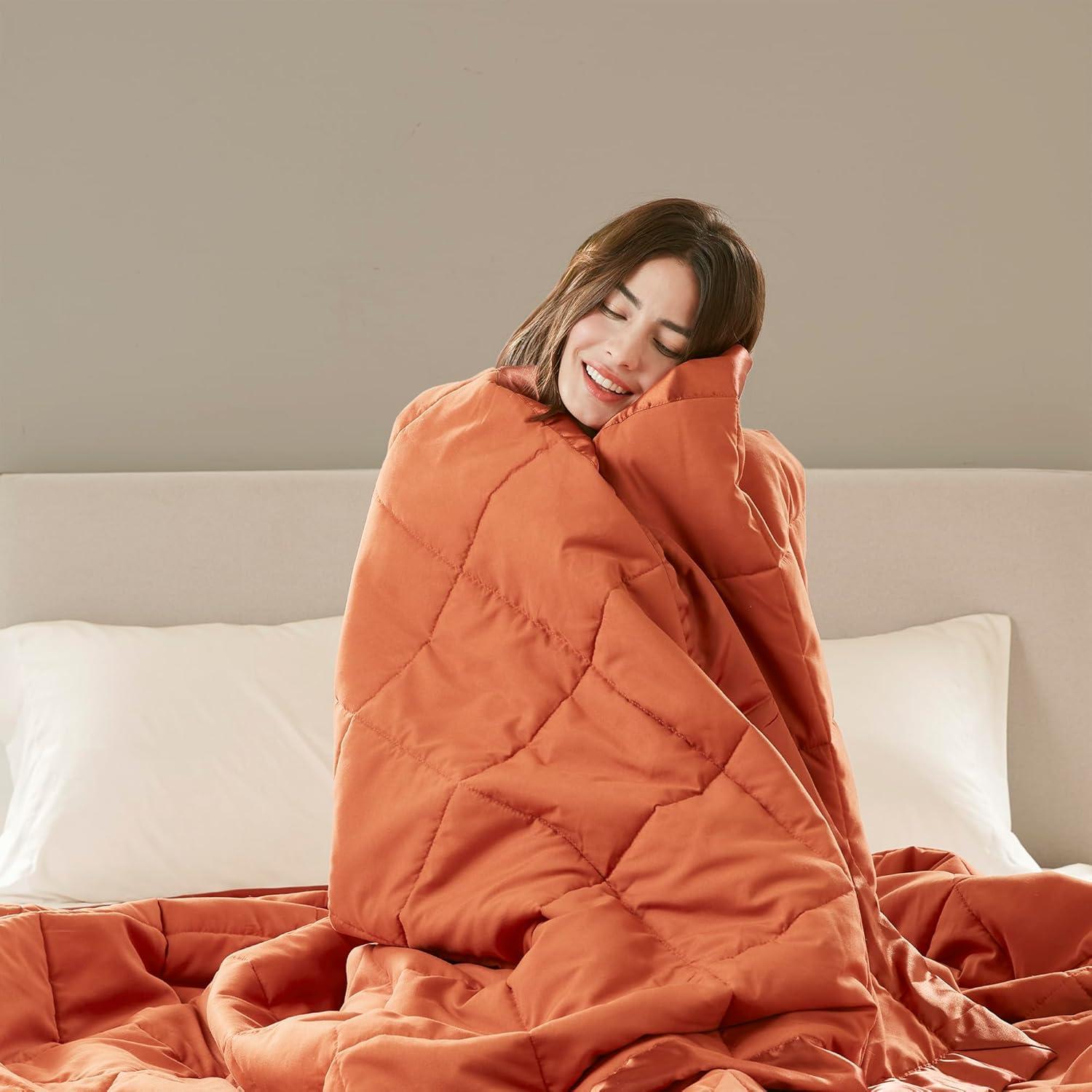 imageMadison Park Twin Blanket Quilted Microfiber Satin Binding 3M Scotchgard Moisture Wicking Treatment Soft and Lightweight Summer Blanket for Couch Windom Twin OrangeOrange