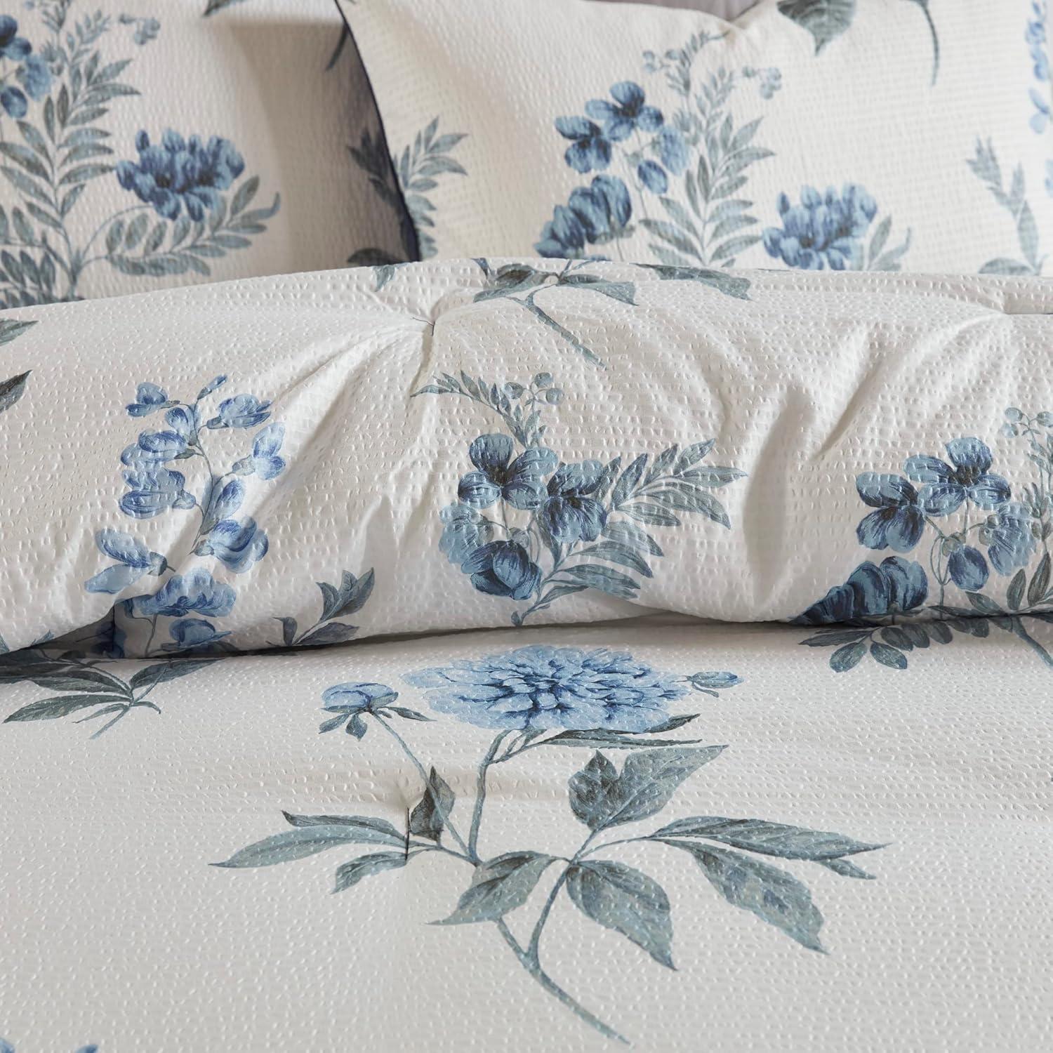 imageMadison Park Zennia Farmhouse Comforter Set with ThrowBlanket Floral Print on Seersucker Textures All Season Bedding Matching Shams Toss Pillows KingCal King104quotx92quot Blue 7 PieceZennia Blue