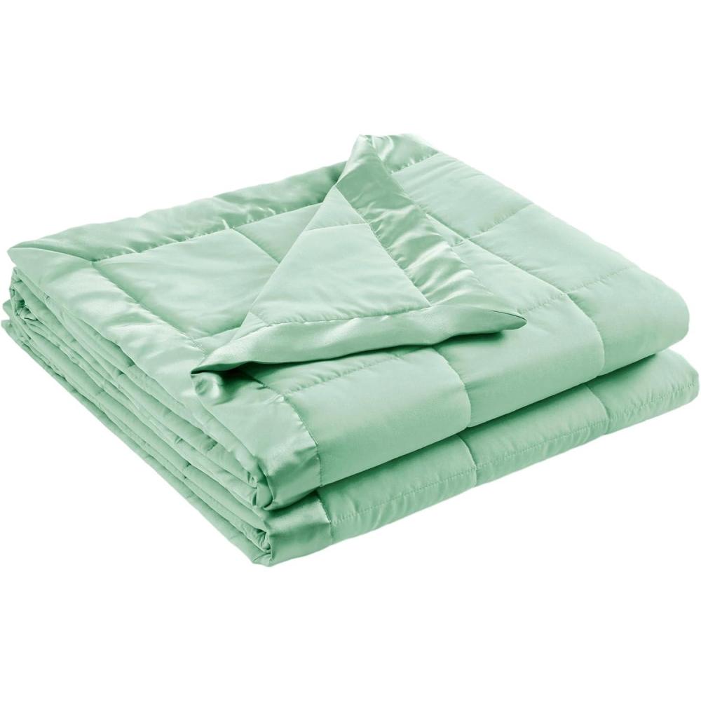 imageMadison Park Twin Blanket Quilted Microfiber Satin Binding 3M Scotchgard Moisture Wicking Treatment Soft and Lightweight Summer Blanket for Couch Windom Twin OrangeSatin Trim Seafoam